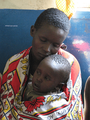 Mother resting her head on her small child